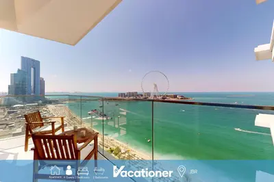 a balcony with a view of the ocean at La Vie, JBR - Cosy Two Bedroom in Dubai