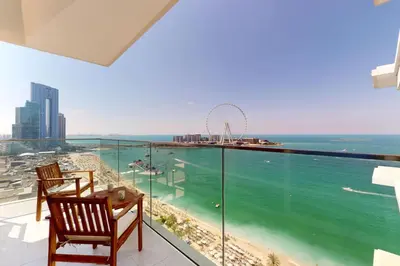 a balcony with a view of the ocean at La Vie, JBR - Cosy Two Bedroom in Dubai