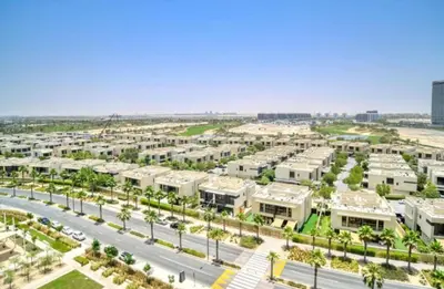 an aerial view of a city with buildings at Lovely One Bedroom Apartment in Dubai