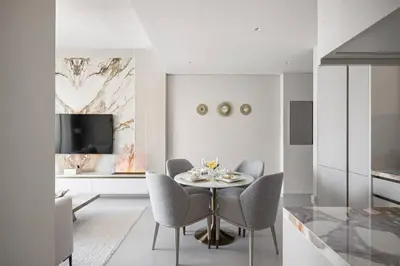 a dining room with a table and chairs at *Views of Burj Khalifa Fountain* in Dubai