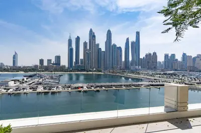 a view of a city with a marina in the foreground at Elegant 1BHK Beach Front Perfect Getaway in Dubai