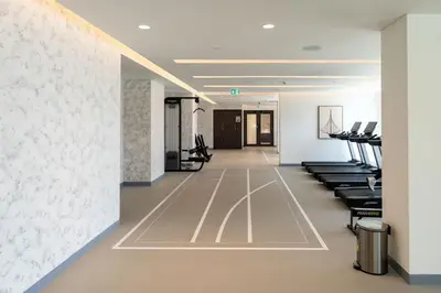 a salon with a row of chairs and a waiting room at Elegant 1BHK Beach Front Perfect Getaway in Dubai