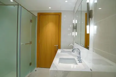 a bathroom with a sink and a shower at Magnificent 3BR with Incredible Burj & Fountain View in Dubai