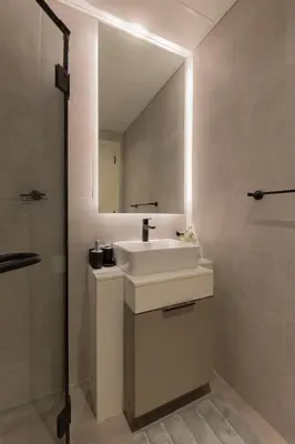 a bathroom with a sink and a mirror at Fresh & Quiet 1BR at Midtown Noor 4 Tower in Dubai