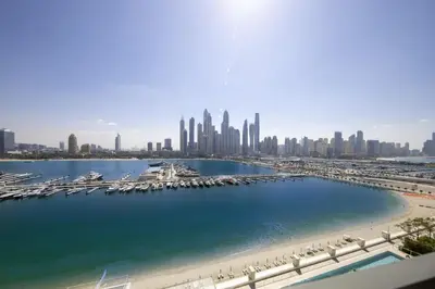 a view of a city skyline with a marina at 2BR Emaar Beachfront with Full Sea & Skyline Views in Dubai