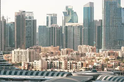 a view of a city with many tall buildings at Burj Khalifa View, High Floor, Dubai Mall Access, Gym, Infinity-Pool, Playground, BBQ, Family Friendly in Dubai