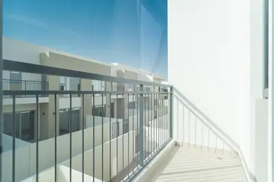 a view of a balcony of a building at Luxurious 3 BR with Maid Room in Arabian Ranches 2 in Dubai