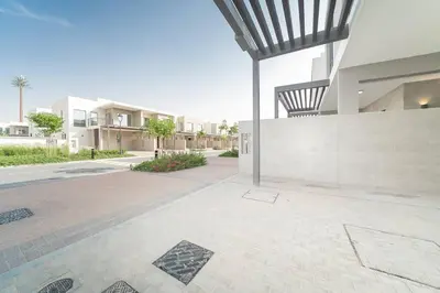 a courtyard of a house with a building at Luxurious 3 BR with Maid Room in Arabian Ranches 2 in Dubai