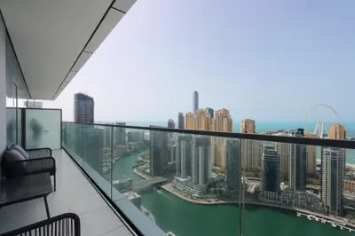 a view of a city from the top of a building at Livbnb - Modern 3BR with Marina & Sunset View in Dubai
