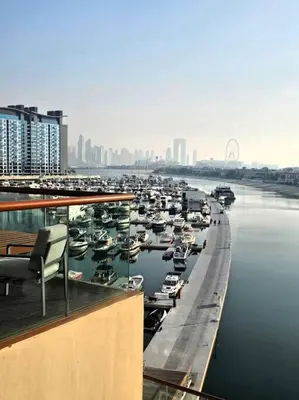 a group of boats docked at a marina in a city at Studio *stunning SEA VIEW* in Dubai