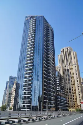 a tall building in the middle of a city at Luxurious & Modern 2BR Plus Maid, Sparkle Tower Dubai Marina - 10AB4 in Dubai