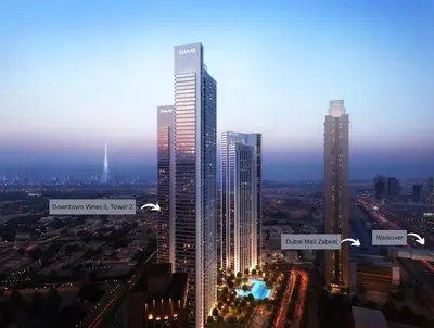 a city skyline with tall skyscrapers at night at Unveil Downtown Luxury, 1BR Majestic Skyline Views - Downtown Views ll in Dubai
