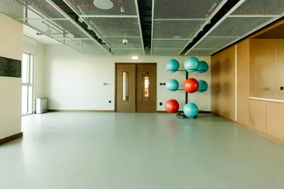 an empty room with blue and red balloons on the wall at Beachfront Elegant 2BD Condo with Breathtaking Views -15AB01 in Dubai