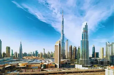 a view of a city with tall buildings at Downtown - Burj Khalifa Facing - 2 Bed Luxe Apartment in Dubai