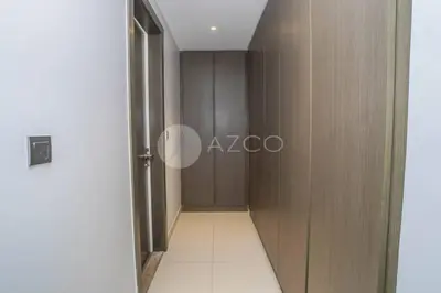 a hallway with a door leading to a room at Stunning 1 BR Damac Maison Prive in Dubai