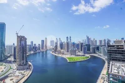 an aerial view of a river in a city at Stunning 1 BR Damac Maison Prive in Dubai