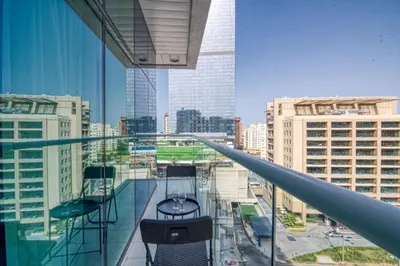 a view from the balcony of a building at The Smart Concierge - Seven Palm in Dubai