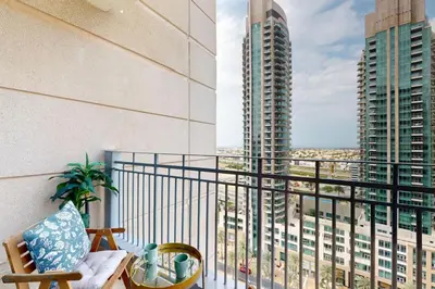 a balcony with a view of a tall building at Standpoint Tower A - Perfect One Bedroom in Dubai