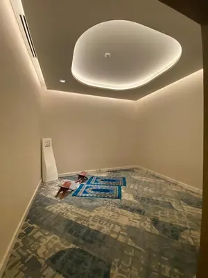 a room with a ceiling with a rug on the floor at Palace Dubai Creek Harbour Residences Skyline Apartment in Dubai