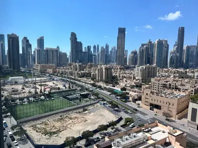 an aerial view of a city with tall buildings at Best Downtown Apartment in Dubai in Dubai