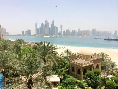 a view of the city of dubai from the resort at Fairmont North 2BR Balcony Sea View in Dubai