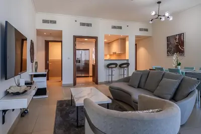 a living room with a couch and a table at 2BDR apartment near Burj Khalifa I Downtown Dubai I Burj Vista in Dubai