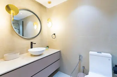 a bathroom with a sink and a mirror at Airy and Peaceful - Studio - JLT in Dubai