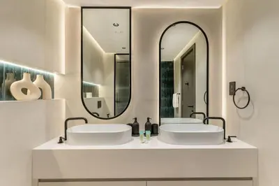 two sinks in a bathroom with a large mirror at Fully Furnished 4 BR in Dubai Marina - Very close to Metro in Dubai