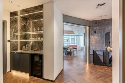 a kitchen and dining room with a marble counter top at Fully Furnished 4 BR in Dubai Marina - Very close to Metro in Dubai