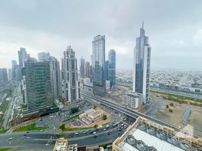 an aerial view of a city with tall buildings at Burj Crown Luxury 2-Bedroom with Balcony in Dubai