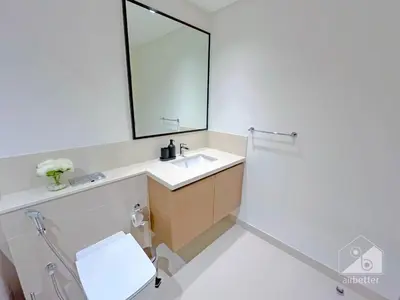 a bathroom with a sink and a mirror at 2BR in Burj Crown l Pool Access & City Views in Dubai