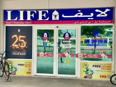 a store front with glass doors and signs on it at Rustic Elegance By The Lake Studio Cabin In Jlt in Dubai