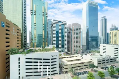a view of a city with tall buildings at LUX The Elegant DIFC Suite 2 in Dubai