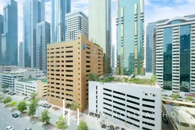 an overhead view of a city with tall buildings at LUX The Elegant DIFC Suite 2 in Dubai