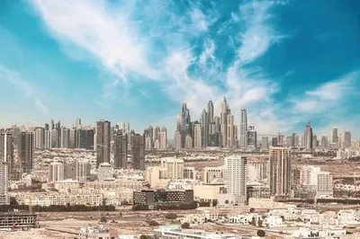 a view of a large city with tall buildings at Dubai Sleek & Cozy Space in Dubai