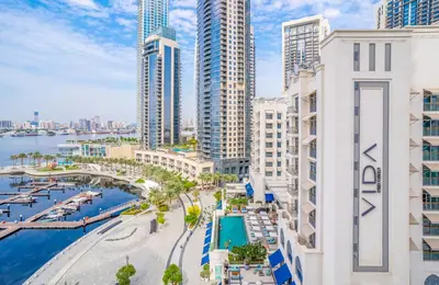 an aerial view of a city with tall buildings at Superior New Luxury Living 2BR Apt Dubai Creek Harbour in Dubai