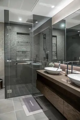 a bathroom with two sinks and a shower at Clever Guest 018 JL Marina gate in Dubai