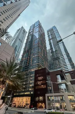 a group of tall buildings in a city at Clever Guest 018 JL Marina gate in Dubai
