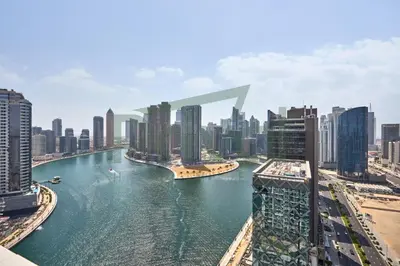a view of a city with a river and buildings at Prival - Prive in Dubai