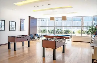 a large room with two ping pong tables at Apartment Dubai Marina, Damac Heights 804 in Dubai