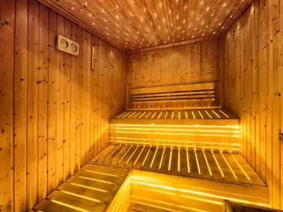 a wooden sauna with two beds in it at Brand new cozy 1 bedroom in Business Bay in Dubai