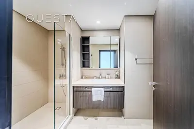 a bathroom with a sink and a shower at Downtown Views I - Burj Khalifa View, Downtown Dubai in Dubai