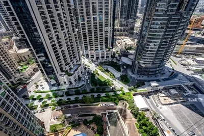 an aerial view of a city with tall buildings at Cozy 1 Bedroom apartment I Downtown Dubai I Near Burj Khalifa in Dubai