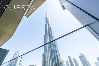 a view of the burj khalifa from the window of a building at Address Residences Dubai Opera - Burj Khalifa & Fountain View, Downtown Dubai in Dubai