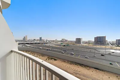 a view of a highway from a balcony at Modern Luxurious Studio in Dubai Silicon Oasis in Dubai
