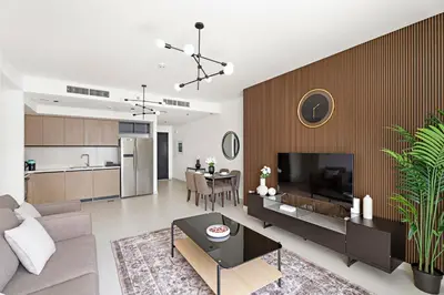 a living room with a couch and a table at Luxurious 2 BR in Downtown Dubai in Dubai