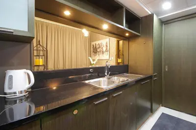 a bathroom with a sink and a mirror at Spectacular 1BHK near Dubai Mall in The Lofts East - TrueBleu Homes in Dubai