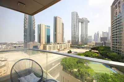 a balcony with a view of a city skyline at Spectacular 1BHK near Dubai Mall in The Lofts East - TrueBleu Homes in Dubai
