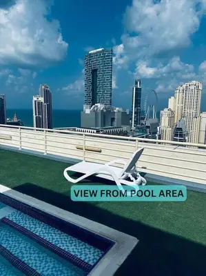 a view of a view from pool area of a city at Lux 1BR w rooftop pool in Marina near metro, Beach in Dubai