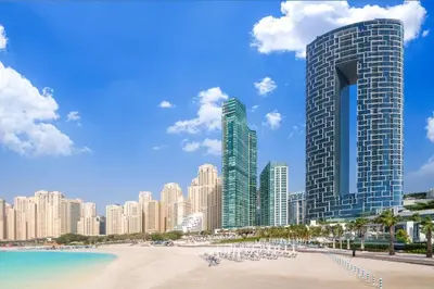a view of a city with a beach and buildings at Address JBR 2 Bedroom With Beach Access by Millennium Vacation Homes in Dubai